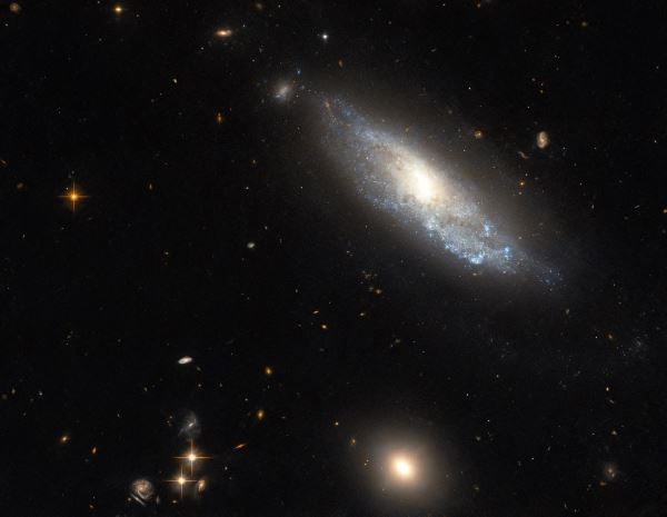 Hubble заметил катастрофические последствия звездного взрыва в далекой галактике